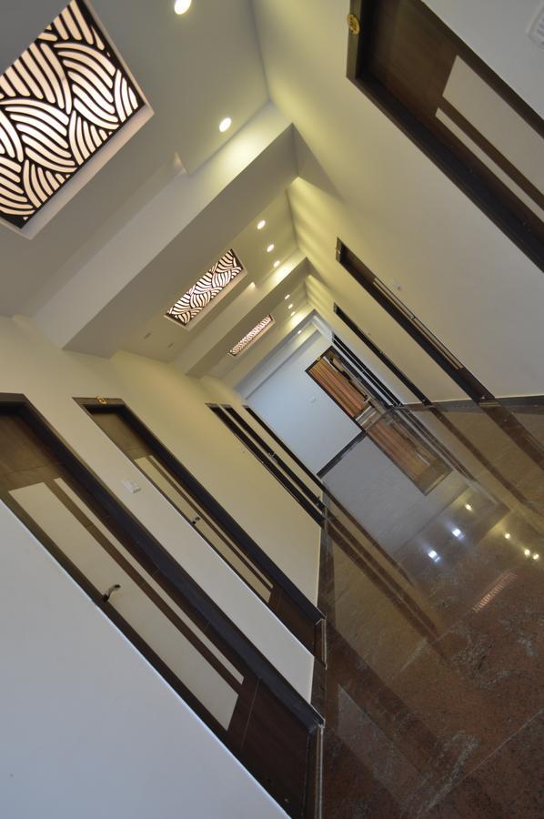 Hotel Ambai Grand Ambasamudram Bagian luar foto