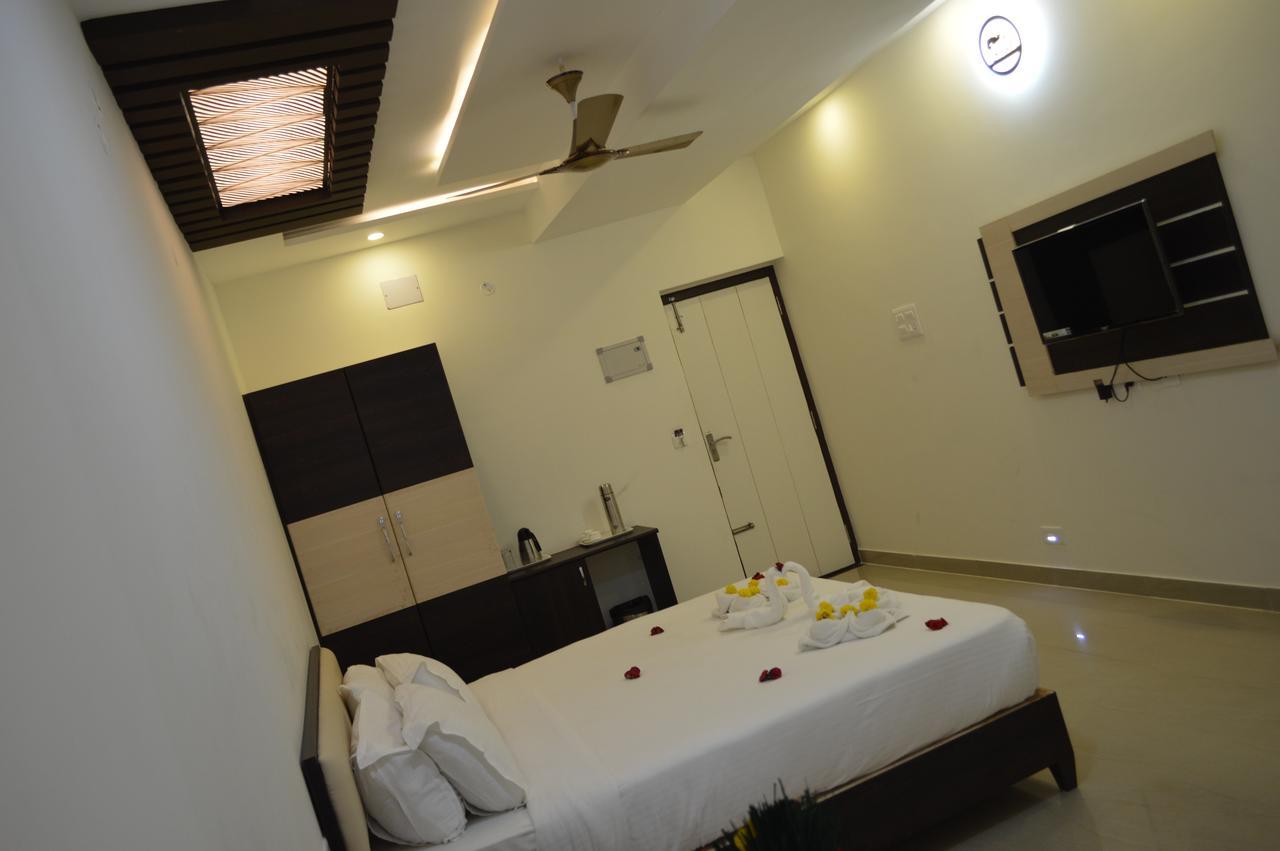Hotel Ambai Grand Ambasamudram Bagian luar foto