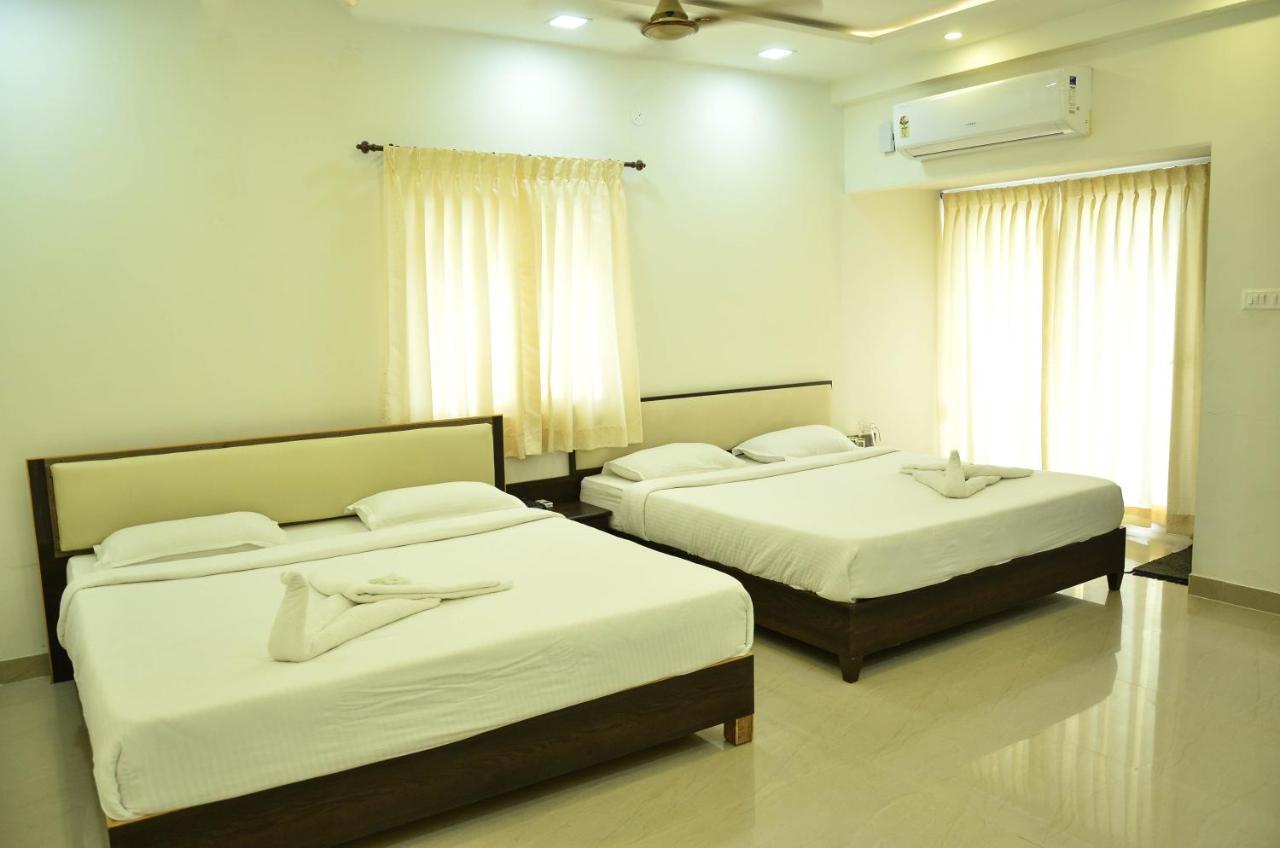 Hotel Ambai Grand Ambasamudram Bagian luar foto