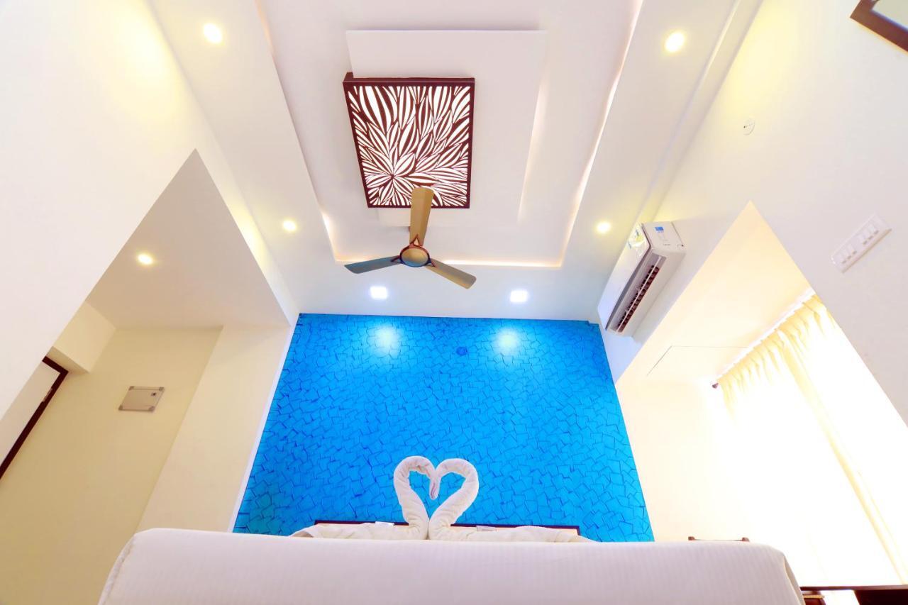 Hotel Ambai Grand Ambasamudram Bagian luar foto
