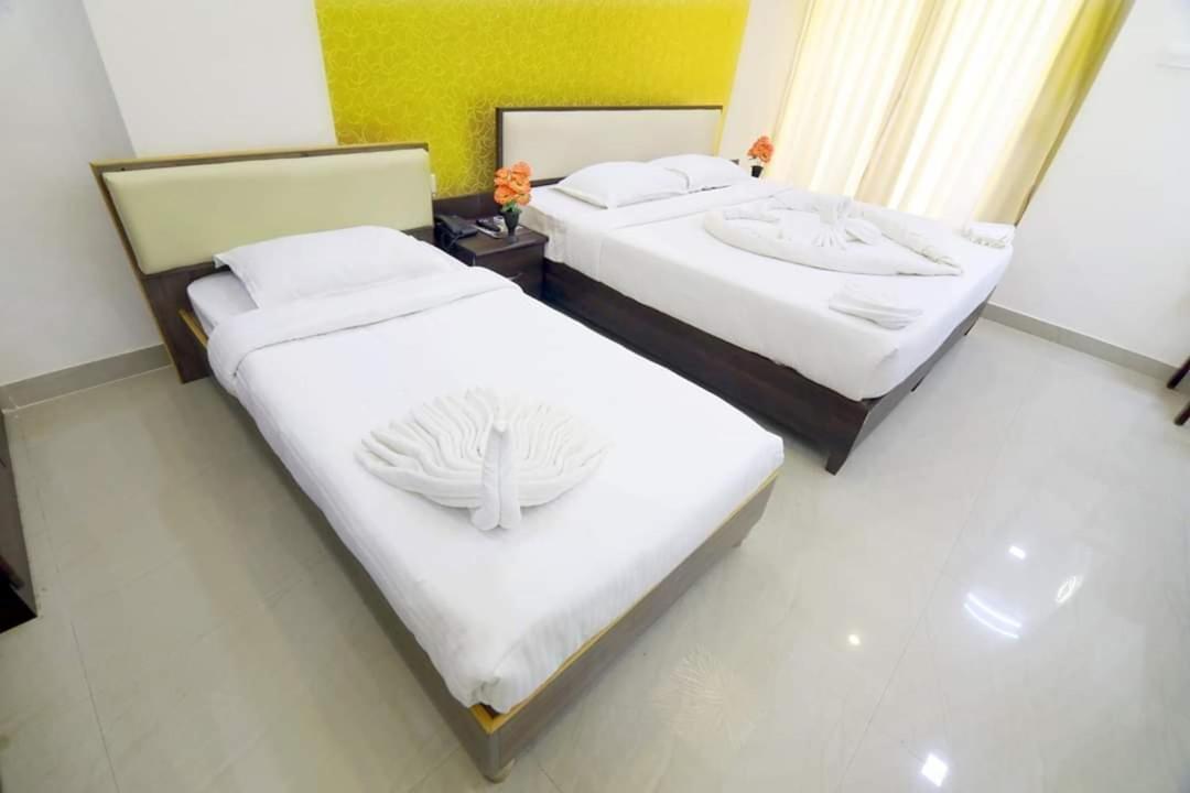 Hotel Ambai Grand Ambasamudram Bagian luar foto