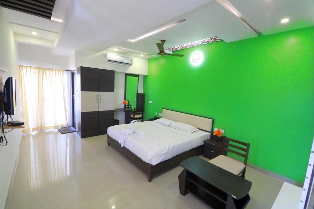Hotel Ambai Grand Ambasamudram Bagian luar foto